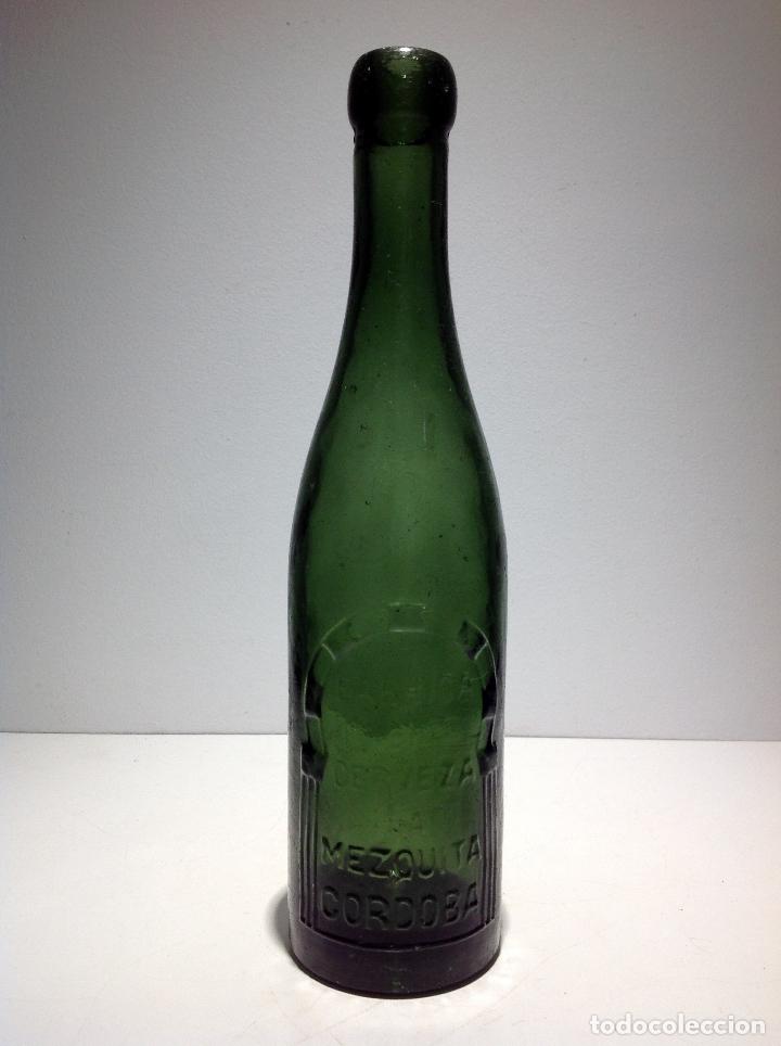 Coleccionismo de cervezas: ANTIGUA Botella de cerveza Mezquita de Cordoba tercio