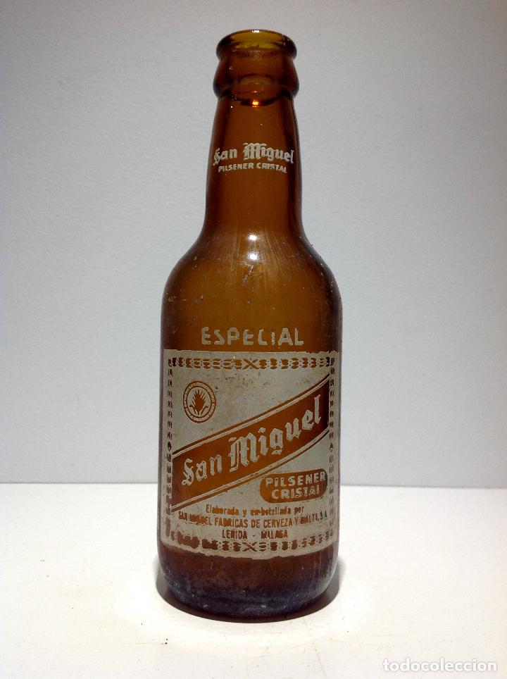 Coleccionismo de cervezas: ANTIGUA BOTELLA DE CERVEZA SAN MIGUEL,QUINTO, LERIDA , MALAGA