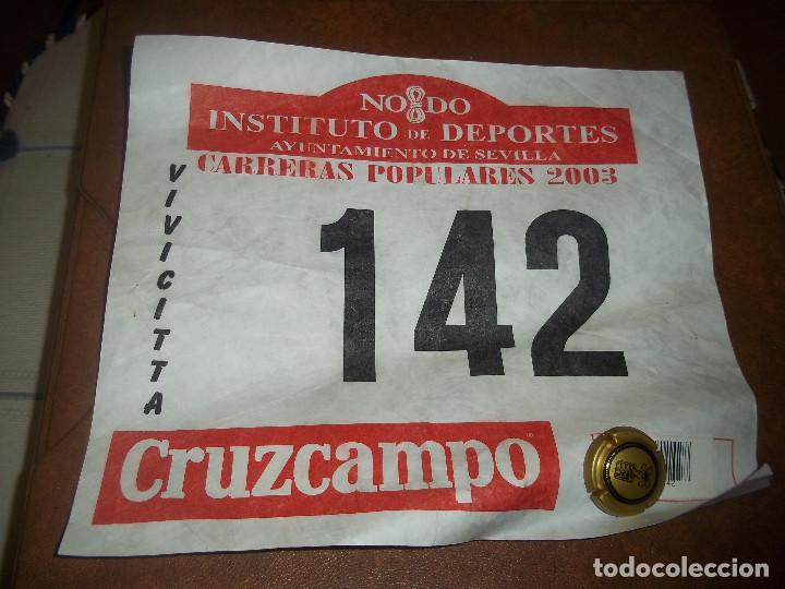 Coleccionismo de cervezas: ANTIGUO DORSAL PAPEL CARRERAS NODO AYUNTAMIENTO DE SEVILLA CARRERAS POPULARES 2003 CERVEZA CRUZCAMPO