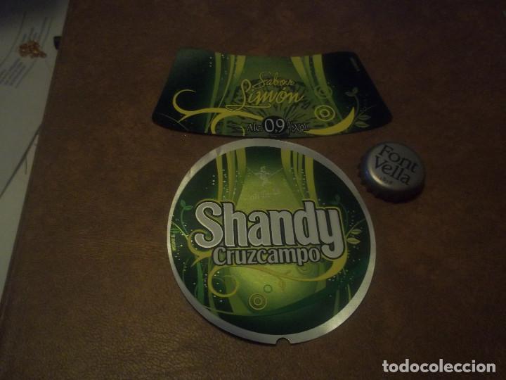 Coleccionismo de cervezas: ETIQUETA Y COLLARIN CERVEZA 1 LITRO SHANDY CRUZCAMPO MODELO OH-LA-LA TRAPECISTA NUEVA SIN USAR