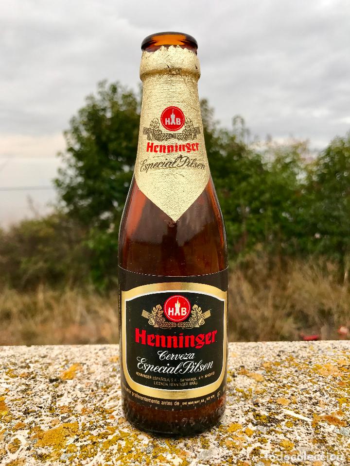 Coleccionismo de cervezas: ANTIGUA BOTELLA DE CERVEZA HENNINGER ETIQUETA DE PAPEL A&Ntilde;O 1987