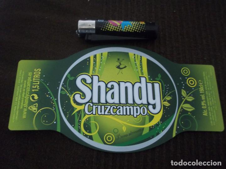 Coleccionismo de cervezas: GRAN ETIQUETA CERVEZA SHANDY CRUZCAMPO 1,5 LITROS MODELO ADIVINA ADIVINANZA SIN USAR