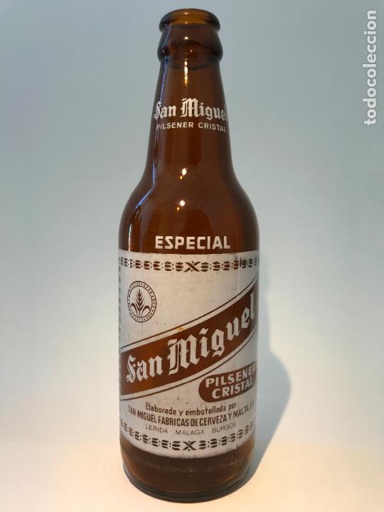 Coleccionismo de cervezas: Botella antigua de cerveza serigrafiada de 33 cl san miguel L&eacute;rida M&aacute;laga Burgos
