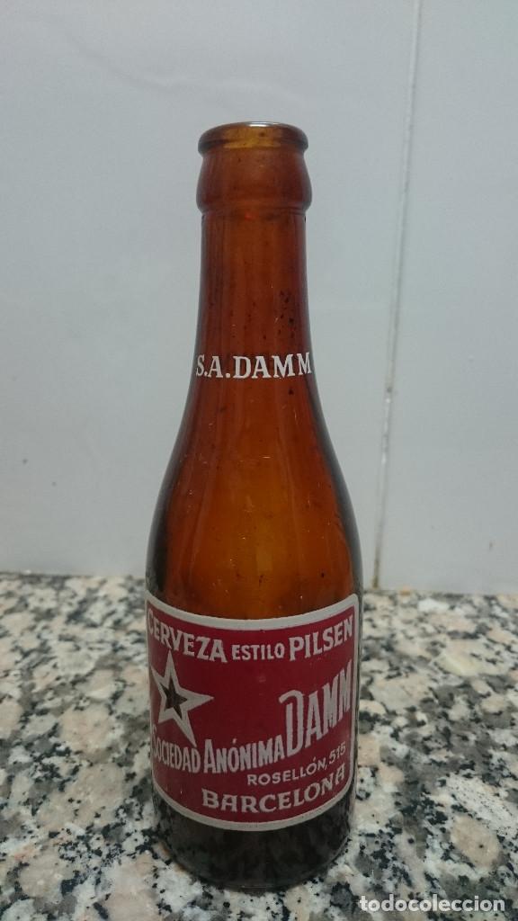 Coleccionismo de cervezas: ANTIGUO BOTELLIN CERVEZA ESTILO PILSEN SOCIEDAD ANONIMA DAMM ROSELLON,515 BARCELONA