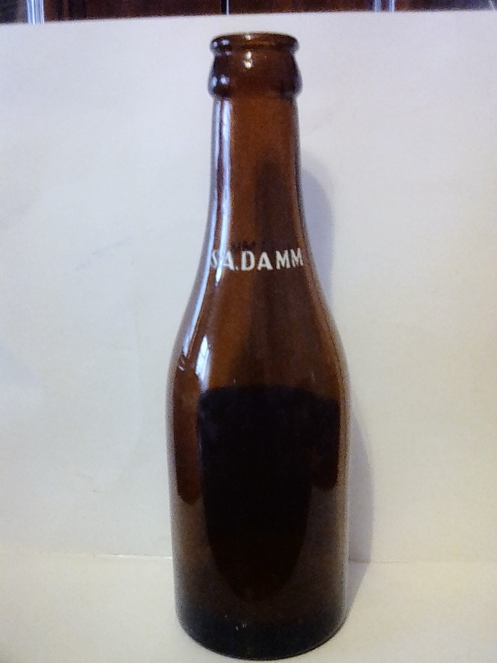 Coleccionismo de cervezas: Botella cervezas damm 1/5 - Foto 2