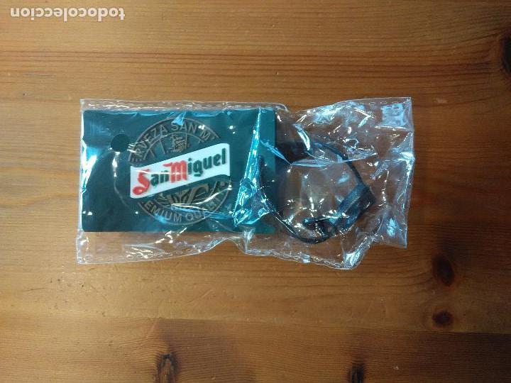 Coleccionismo de cervezas: ETIQUETA PARA MALETA PROMOCI&Oacute;N CERVEZA SAN MIGUEL. MIDE 12cm X 5cm.
