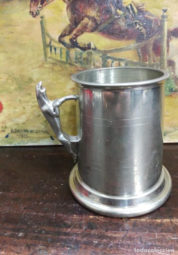 Coleccionismo de cervezas: Jarra de cerveza de la casa Jaguar con ba&ntilde;o de plata