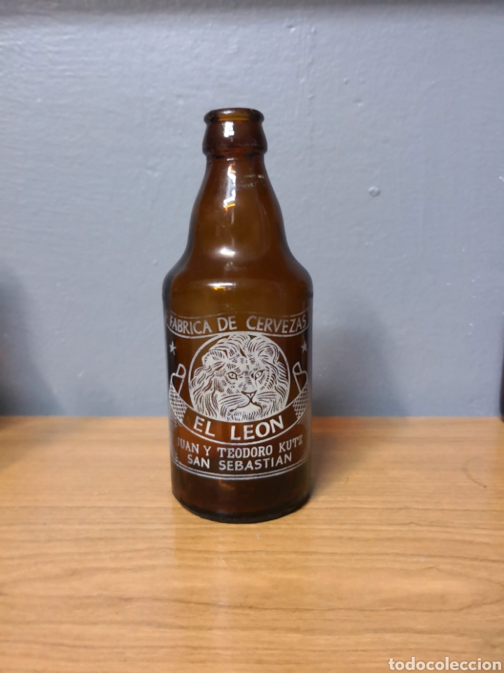 Coleccionismo de cervezas: Botella cerveza EL LEON, tercio la Leona. Botellin - Foto 1