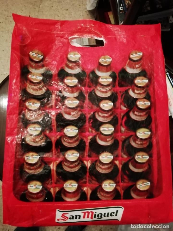 Coleccionismo de cervezas: Blosa plastica botella cerveza San Miguel