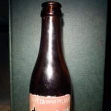 Coleccionismo de cervezas: ANTIGUA BOTELLA DE CERVEZA - SOCIEDAD ANÓNIMA DAMM - TIPO PILSEN - CON ETIQUETA 19 CM. DE ALTA X 6