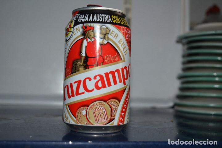 Coleccionismo de cervezas: LATA DE CERVEZA MARCA CRUZCAMPO PROMOCION VIAJA A AUSTRIA 330 ML