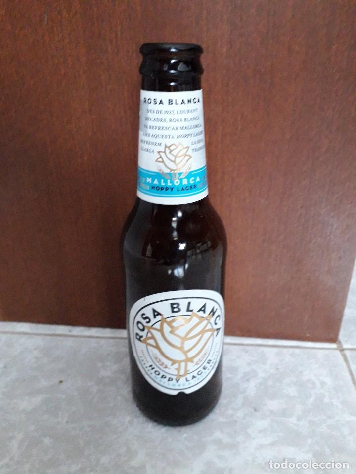 Coleccionismo de cervezas: botella vac&iacute;a de cerveza rosa blanca de Mallorca.