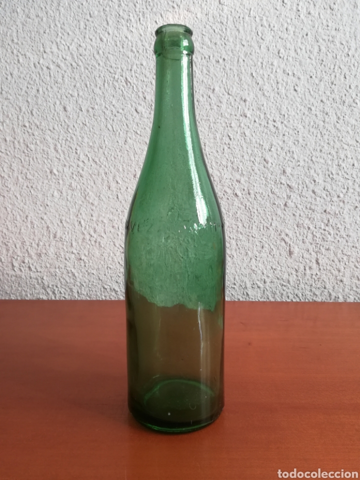 Coleccionismo de cervezas: Botella Cerveza Damm en relieve - 28 cms cristal verde