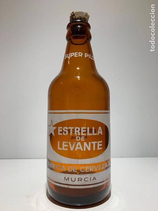 Coleccionismo de cervezas: BOTELLA ANTIGUA DE CERVEZA ESTRELLA LEVANTE 33 CL, SUPER PILS EN CUELLO EN LETRAS GRANDES
