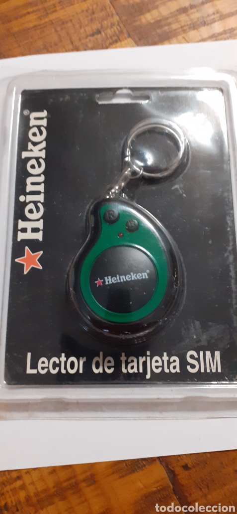Coleccionismo de cervezas: HEINEKEN- LLAVERO- LECTOR DE TARJETA SIM-ALMACENAJE DE CONTACTOS