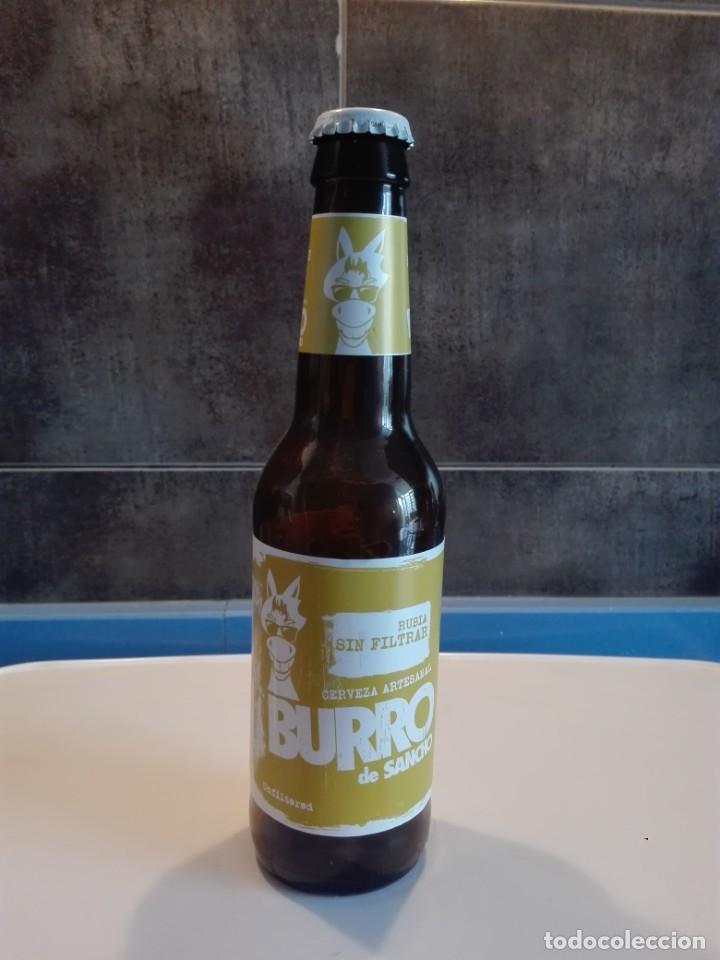 Sammeln von Brauereiartikeln: BOTELLA CERVEZA VACIA + CHAPA - BURRO DE SANCHO / RUBIA SIN FILTRAR - 200GR