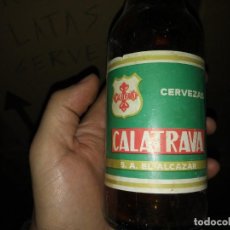Coleccionismo de cervezas: BOTELLA DE CERVEZA CALATRAVA CIUDAD REAL EL ALCAZAR JAEN DE 33 CL