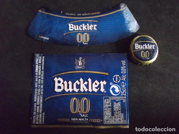 Collectionnisme de bi&egrave;res: CERVEZA-V9B-8-ETIQUETAS Y CHAPA-BUCKLER 0,0