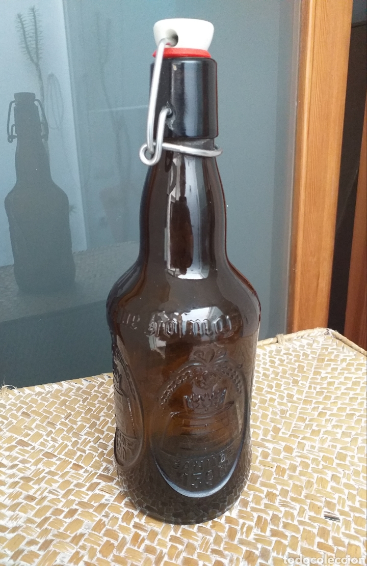 Coleccionismo de cervezas: Botella de cerveza de cristal tallado 24 cm altura