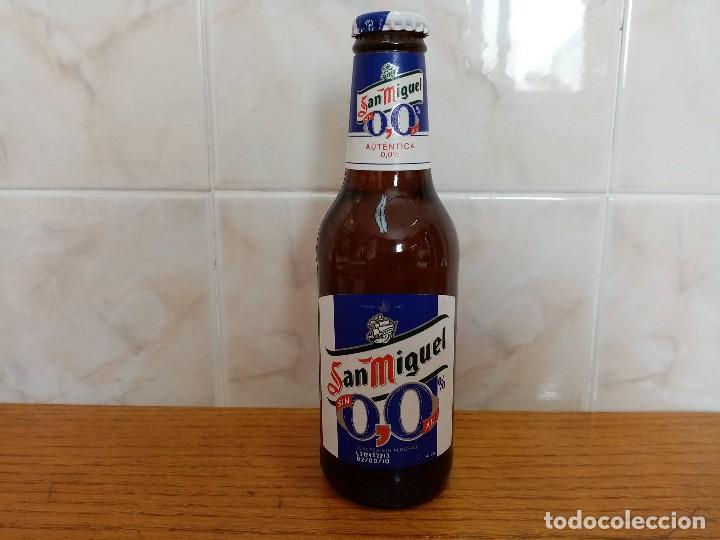 Coleccionismo de cervezas: BOTELLA DE CERVEZA SAN MIGUEL 0,0. 25 CC. ETIQUETA PAPEL EST&Aacute; LLENA