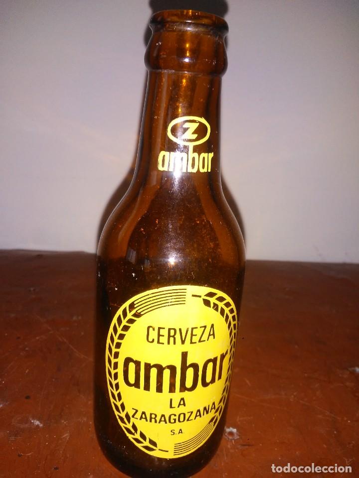 Coleccionismo de cervezas: Antiguo botell&iacute;n de cerveza ambar la zaragozana serigrafiado. Muy bien conservado.