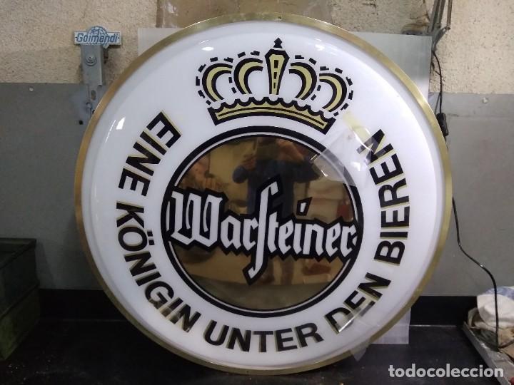 Colecionismo de cervejas: Cartel de cerveza Warsteiner a estrenar.
