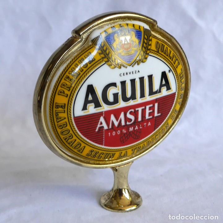 Sammeln von Brauereiartikeln: Placa doble de porcelana y bronce Aguila amstel