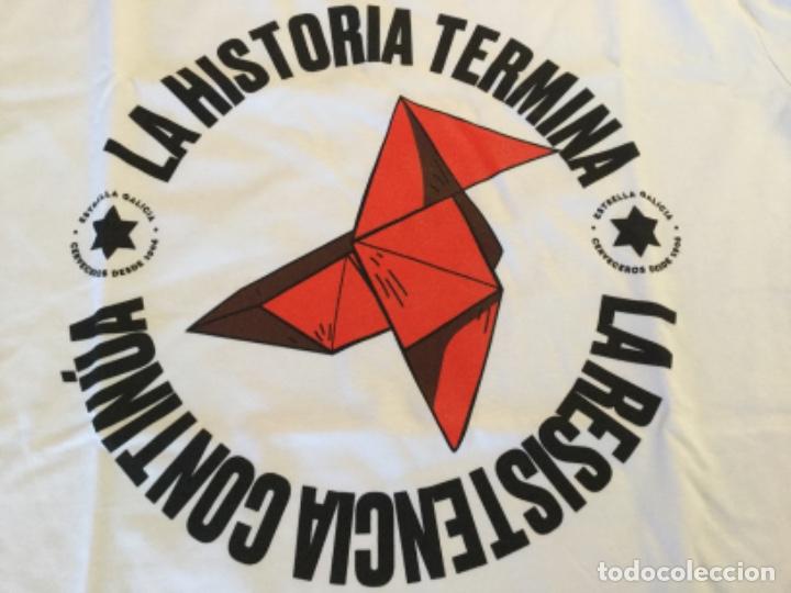 Coleccionismo de cervezas: ESTRELLA DE GALICIA - LA CASA DE PAPEL - LA HISTORIA TERMINA - CAMISETA - SIN USAR