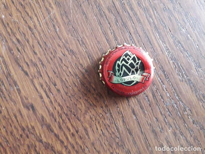 Coleccionismo de cervezas: chapa tap&oacute;n corona de cerveza de Madrid La Vigen, l&uacute;pulo.