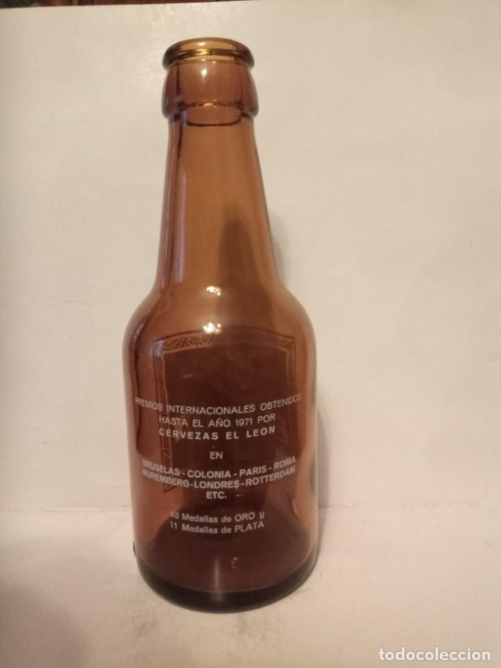 Coleccionismo de cervezas: Botella cerveza El le&oacute;n 1/5 - Foto 2
