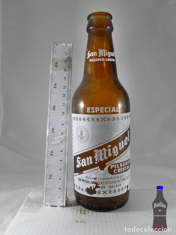 Coleccionismo de cervezas: BOTELLIN CERVEZA SAN MIGUEL PILSENER CRISTAL MALAGA