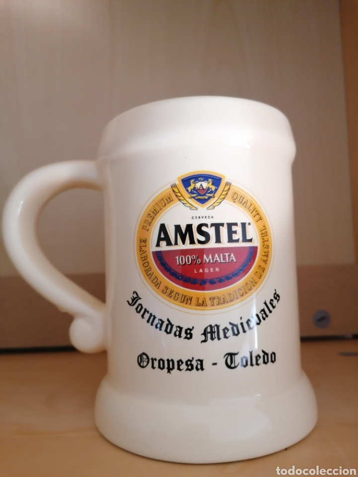 Coleccionismo de cervezas: Jarra de cer&aacute;mica de cerveza Amstel. Jornadas Medievales. Oropesa. Toledo.