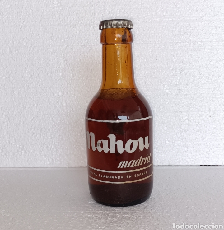 Coleccionismo de cervezas: Cerveza llena Mahou Madrid quinto chapa aceptable