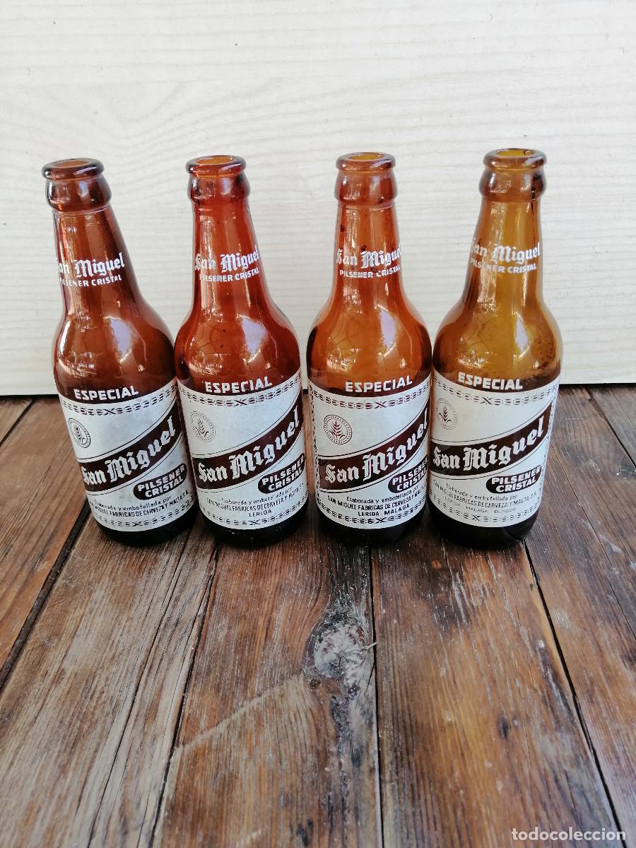 Coleccionismo de cervezas: 4 BOTELLAS CERVEZA SAN MIGUEL ESPECIAL DIFERENTES SERIGRAFIADAS.
