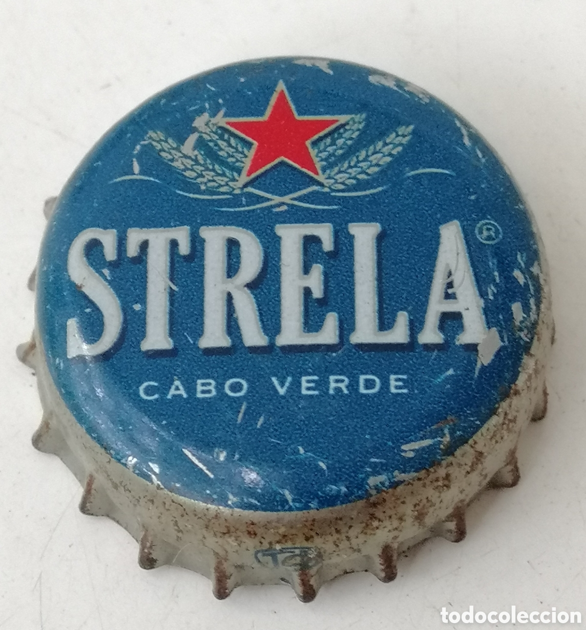 Coleccionismo de cervezas: BOTTLE CAP TAP&Oacute;N CORONA BIRRA BEER BIER CHAPA CERVEZA STRELA (1).CABO VERDE.--LOTE N. 867--CARMANJO