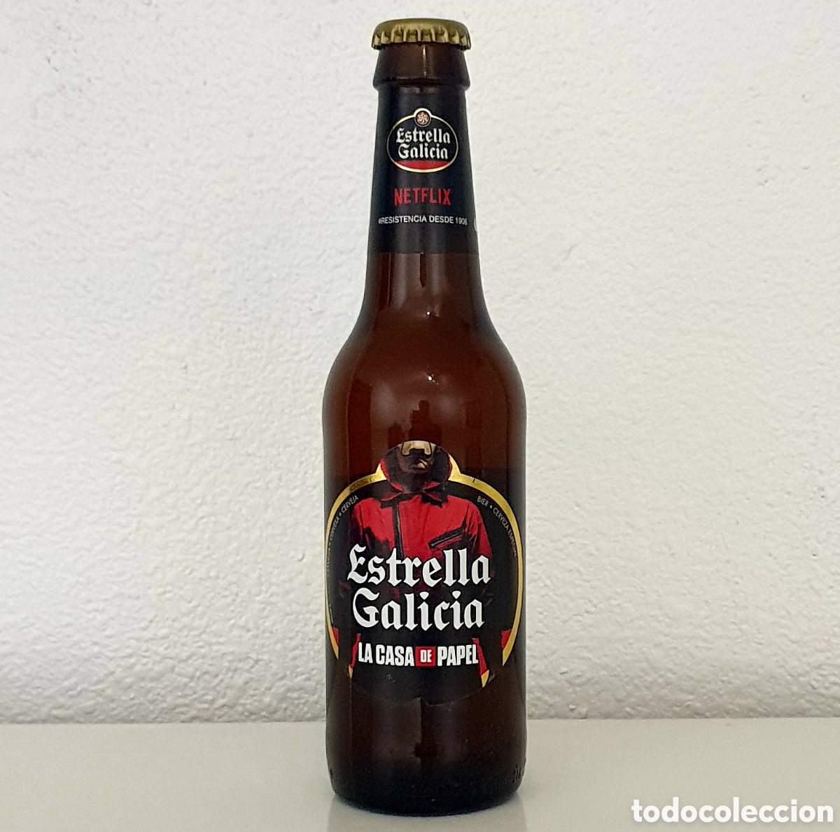 Coleccionismo de cervezas: Botella Cerveza - Espa&ntilde;a - Estrella Galicia - La Casa De Papel - Cristal - (Llena)