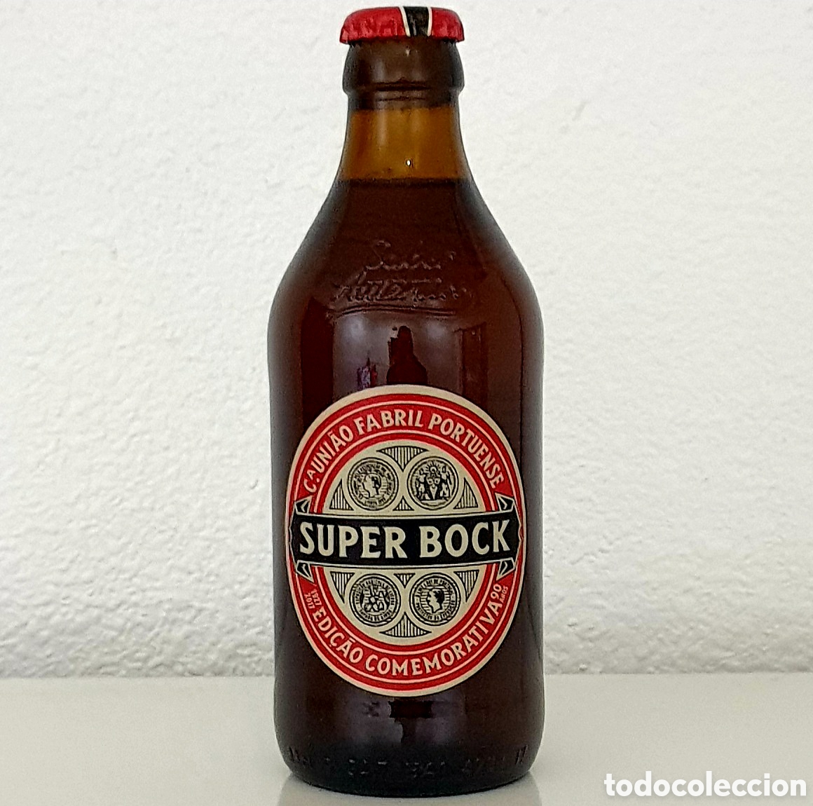 Coleccionismo de cervezas: Botella Cerveza - Portugal - Super Bock - Edici&oacute;n Limitada Conmemorativa 90 A&ntilde;os - Cristal - (Llena)