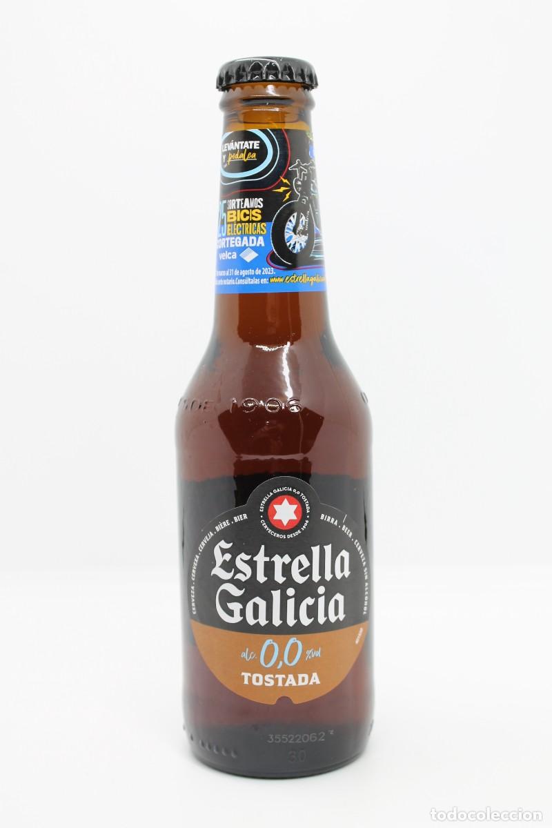 Coleccionismo de cervezas: botella llena cerveza ESTRELLA GALICIA TOSTADA 0,0 25cl BICICLETA ELECTRICA biere beer birra cerveja