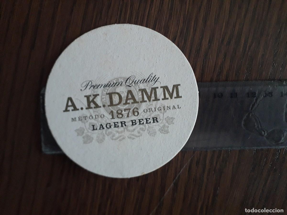 Coleccionismo de cervezas: posavasos de cerveza, A. K. Damm. 9 cm. de di&aacute;metro.