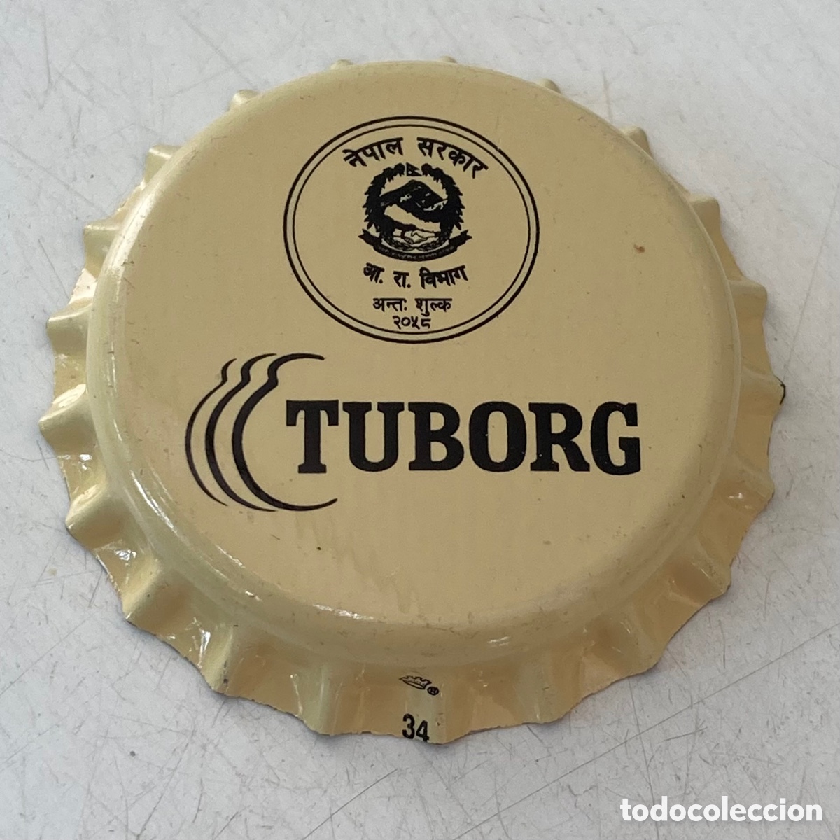 Coleccionismo de cervezas: CAPSULE BOTTLE CAP BEER TAP&Oacute;N CORONA CHAPA BIERE CERVEZA TUBORG. NEPAL.(14)--LOTE N. 753-- CARMANJO