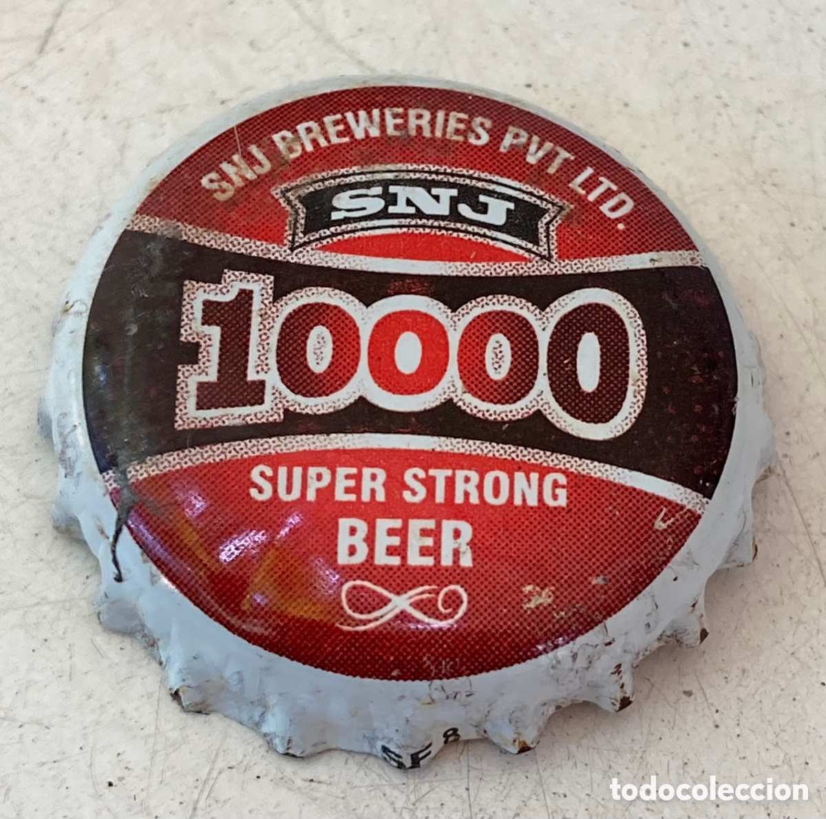 Coleccionismo de cervezas: TAP&Oacute;N CORONA CHAPA CERVEZA BEER BIERE BOTTLE CAP BIRRA SNJ 10000. INDIA.(6)--LOTE N. 1363--CARMANJO