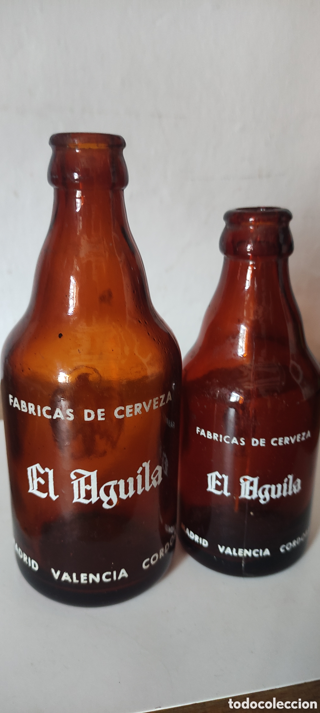 Coleccionismo de cervezas: ANTIGUOS BOTELLINES EL AGUILA - Foto 1