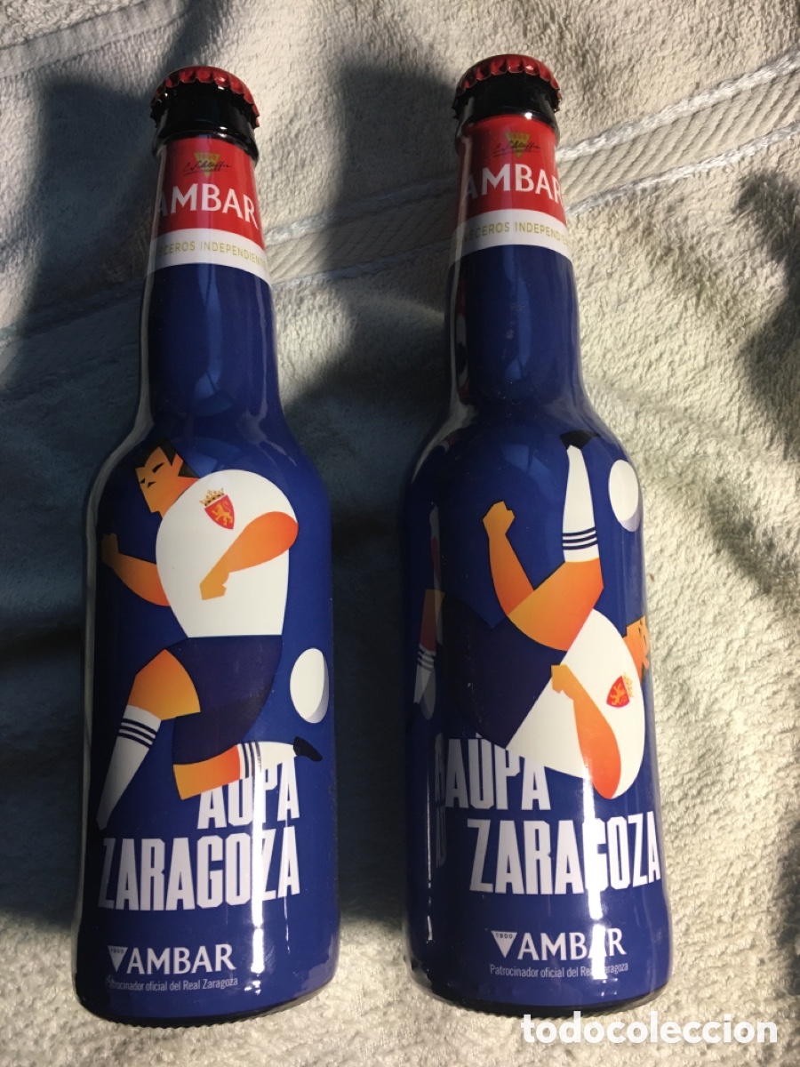 Coleccionismo de cervezas: 2 Botellas cerveza Ambar. Aupa Zaragoza A Birra y a Vencer. Real Zaragoza CF. Los 2 modelos. Vacias