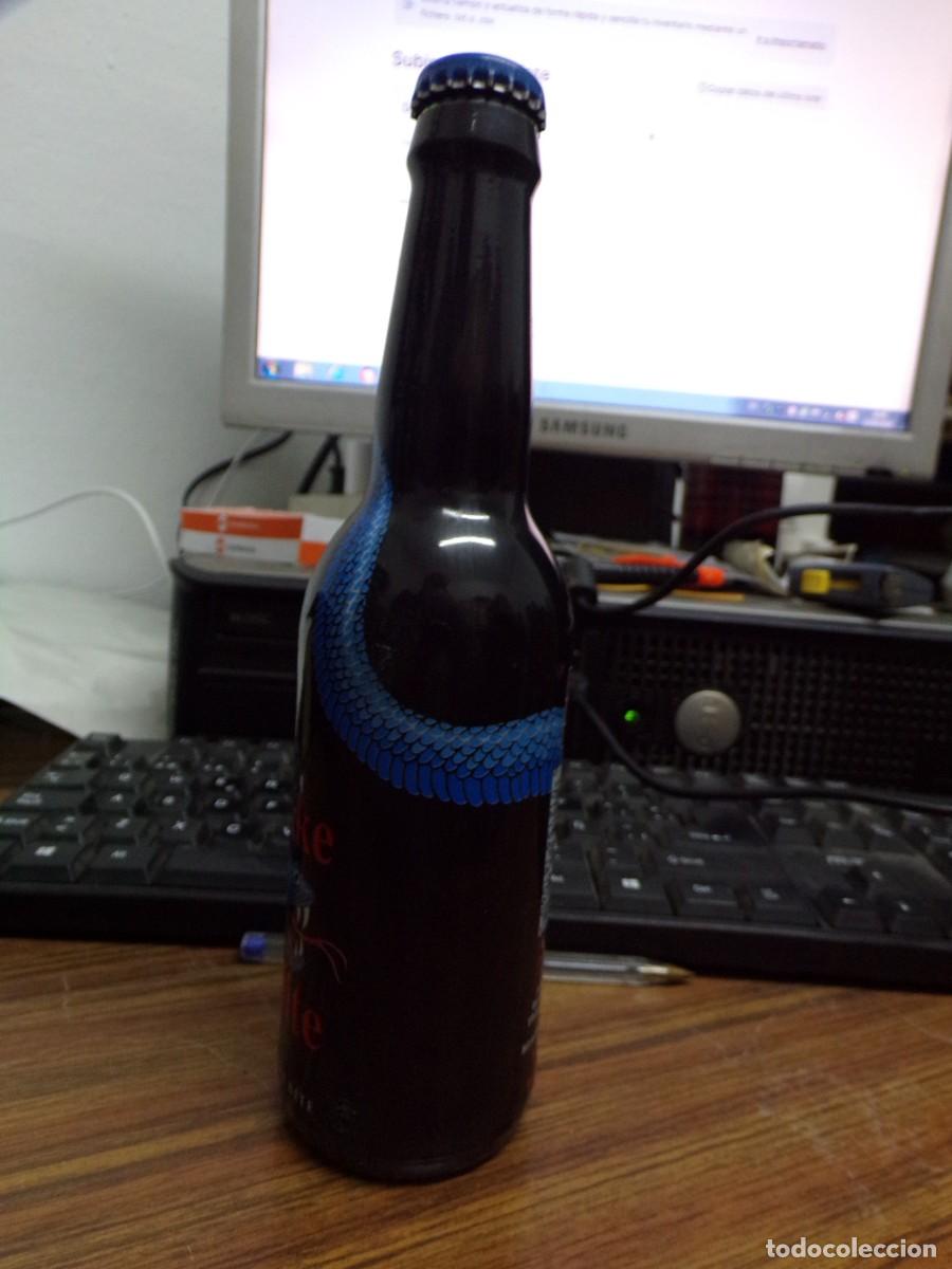 Coleccionismo de cervezas: ESTAMOS LIQUIDANDO. botella snake bite old deadly&acute;s snake bite 330 ml - Foto 2