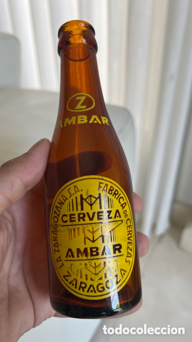 Coleccionismo de cervezas: BOTELLA ANTIGUA DE CERVEZA AMBAR, LA ZARAGOZANA 20 CL.