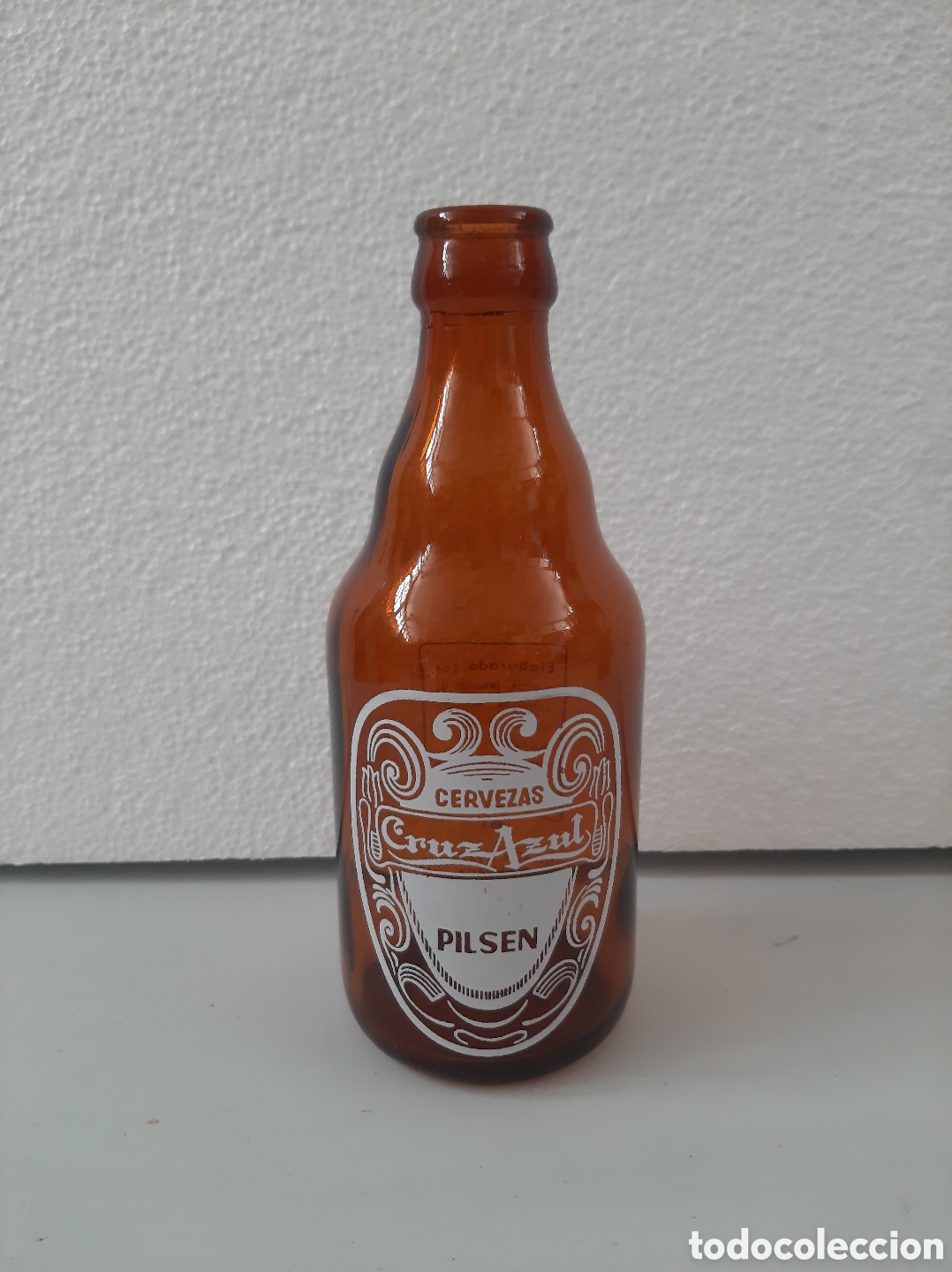 Coleccionismo de cervezas: Botella de cerveza antigua CRUZ AZUL , PAMPLONA
