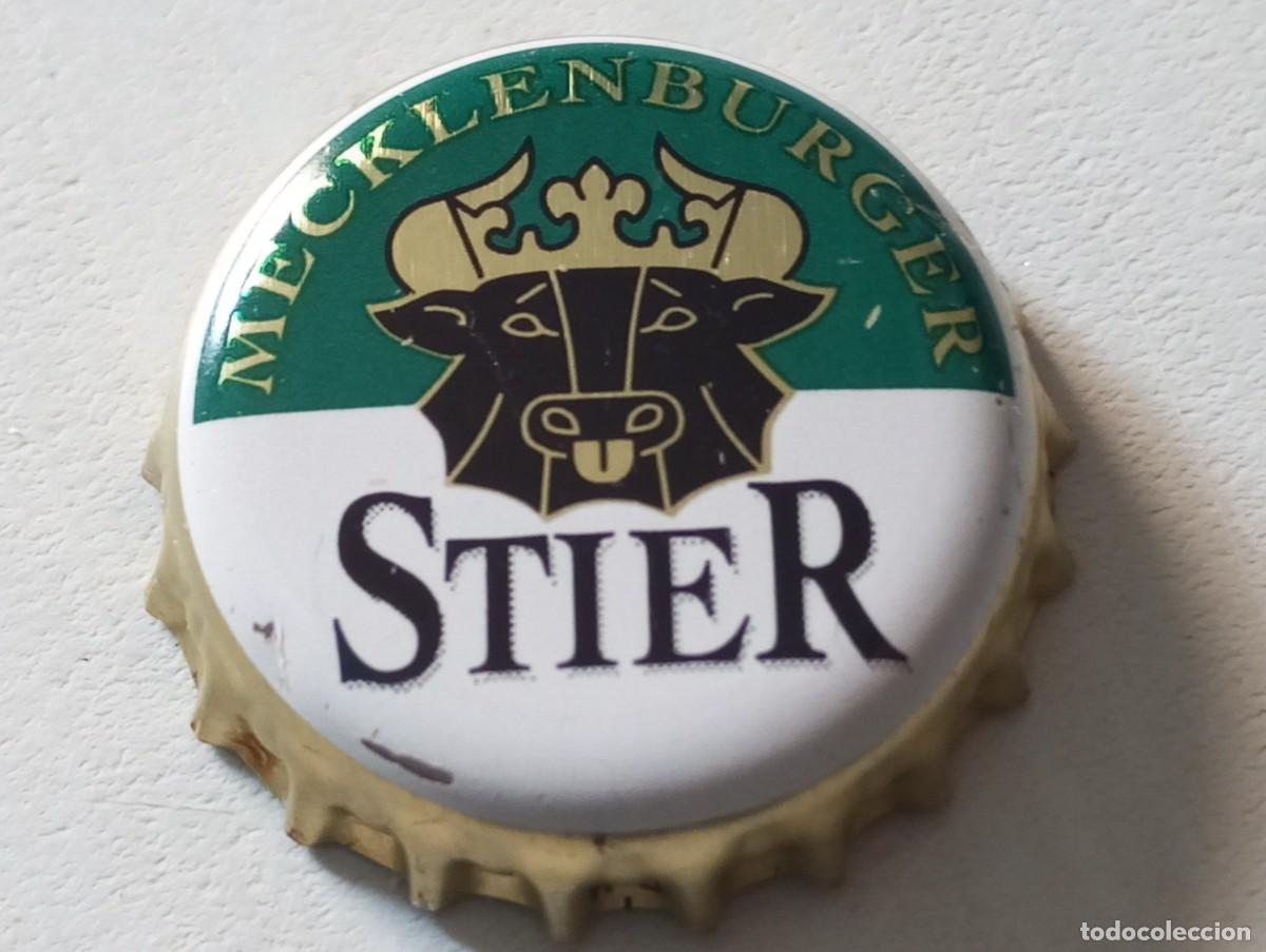 Coleccionismo de cervezas: Chapa tap&oacute;n corona de la cerveza alemana MECKLENBURGER STIER (falda dorada)