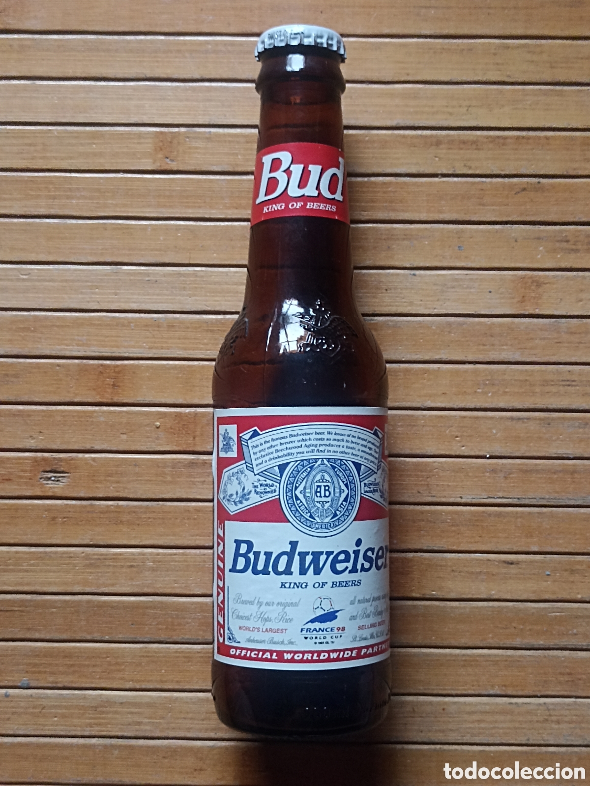 Coleccionismo de cervezas: Botella cerveza Budweiser Mundial World Cup F&uacute;tbol 98 Francia - 25 cl vac&iacute;a con chapa