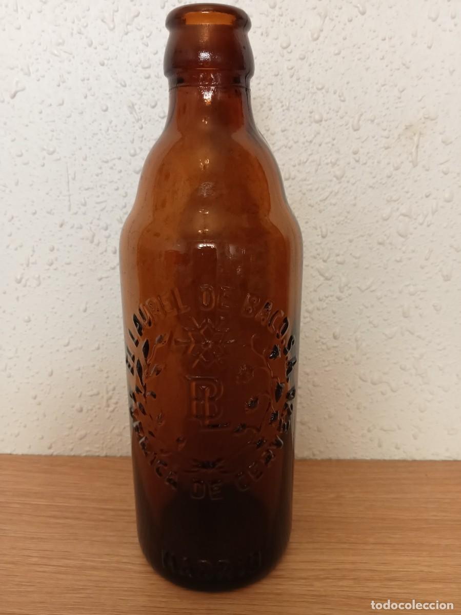 Coleccionismo de cervezas: Botella cerveza laurel de baco en relieve - Foto 1