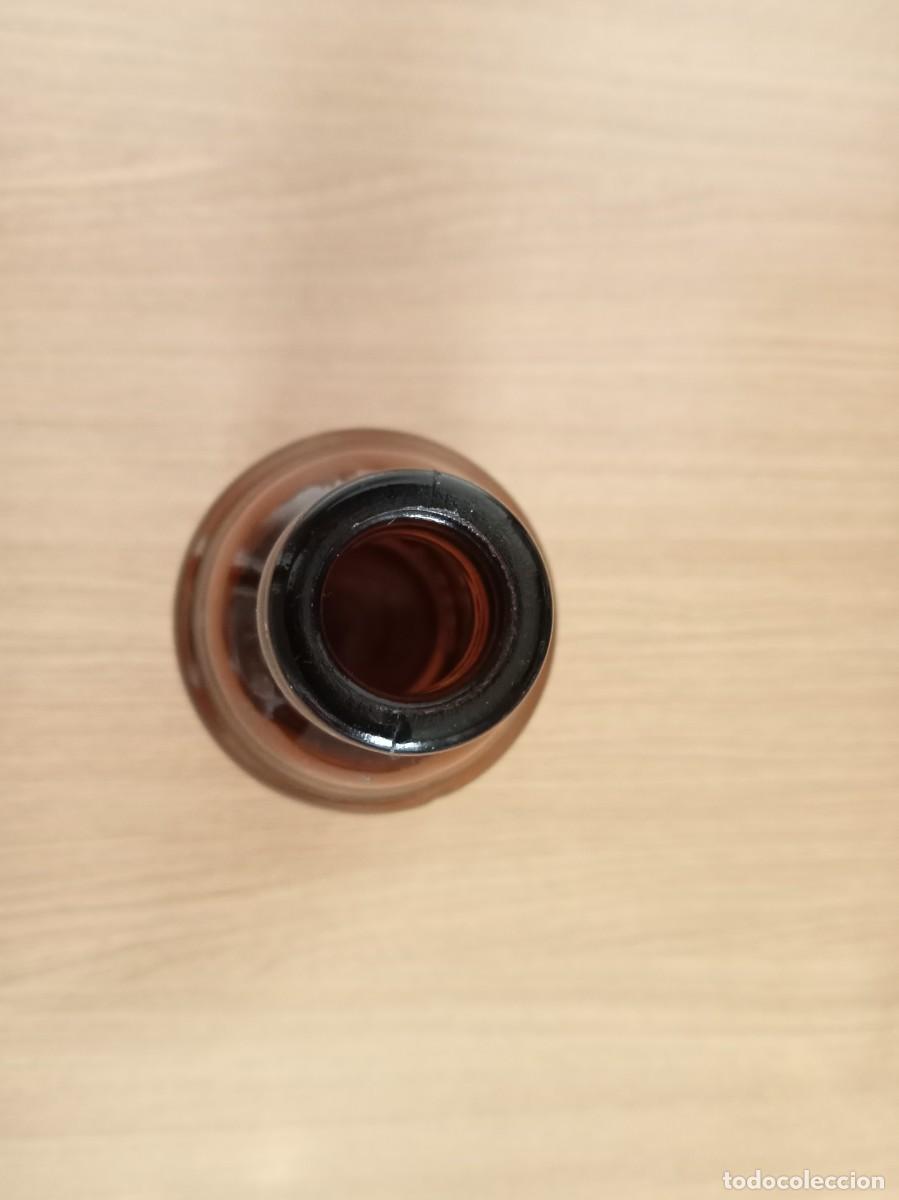 Coleccionismo de cervezas: Botella cerveza laurel de baco en relieve - Foto 4